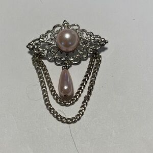 Elegant Silver and Pink Brooch